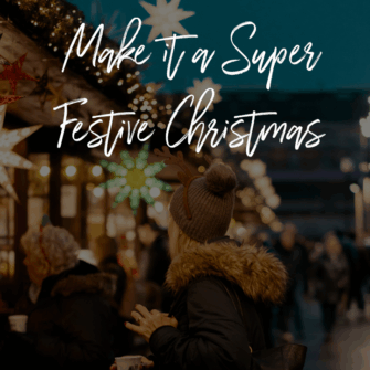 Festively decorated Christmas tree with colorful lights, ornaments, and a star topper, surrounded by wrapped gifts in an elegantly adorned room with a cozy atmosphere.